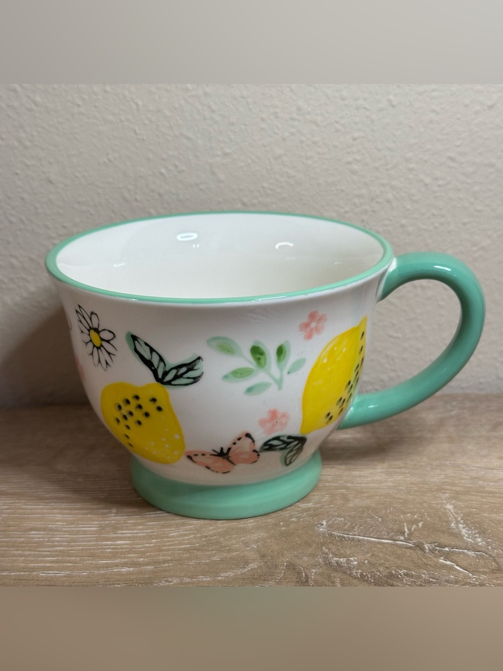 POTTER'S STUDIO Floral footed Mug Lemon Butterfly & flowers In Mint Green